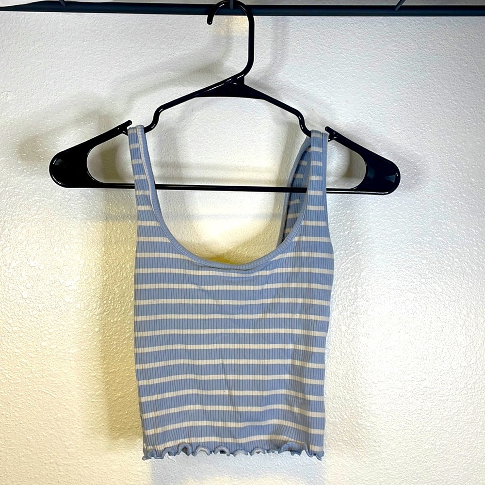 Striped crop top with ruffles on bottom.